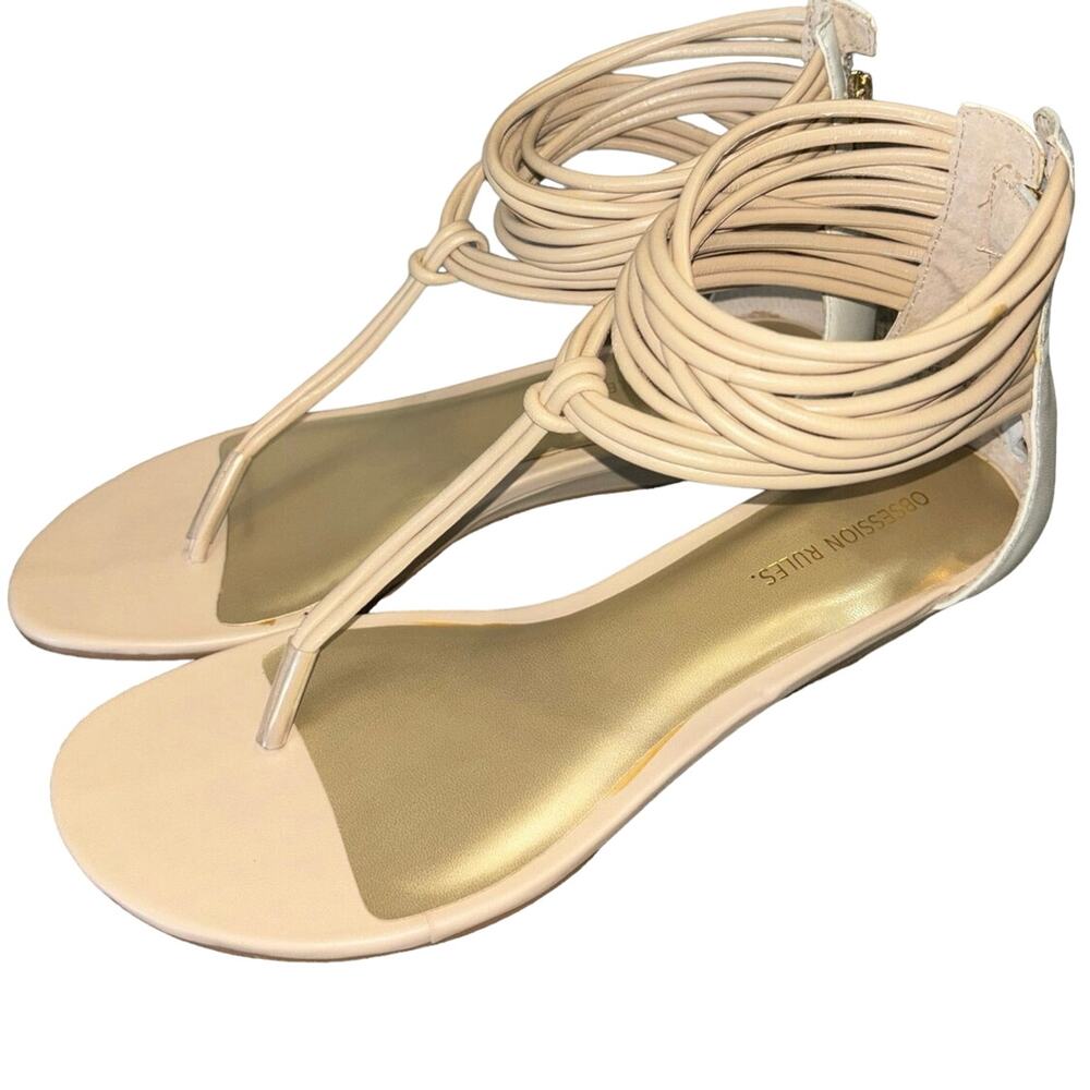 Obsession Rules Camille women’s nude/white thong strappy zip sandals (size 8.5)